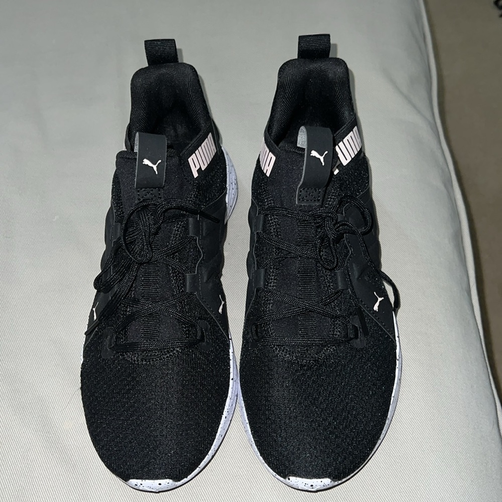Puma excellent Condition.  Size 9 Black SoftFoam sneakers.